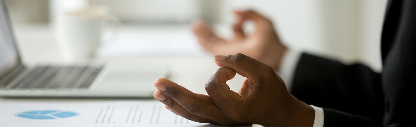 An man of color meditating