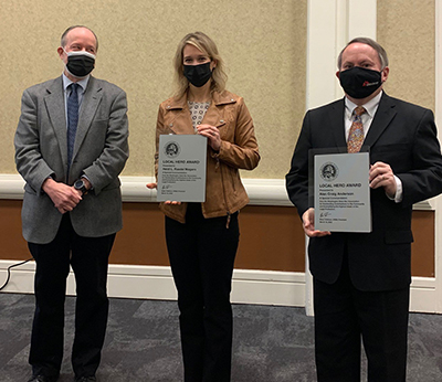 WSBA President Brian Tollefson with new Local Heroes Heidi L. Raedel Magaro and Alan Craig Anderson